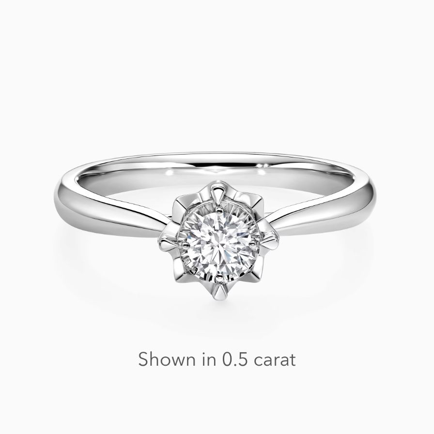 Round Diamond Star 4-Prong Solitaire Engagement Ring Round Diamond Star 4-Prong Solitaire Engagement Ring