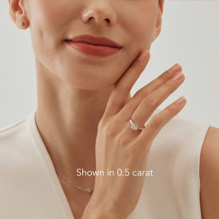 Round Diamond Star 4-Prong Solitaire Engagement Ring Round Diamond Star 4-Prong Solitaire Engagement Ring